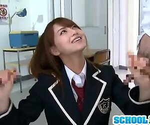 Japanese teen devours these two hard cocks