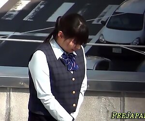 Asian teen pisses herself
