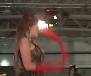 Magnificent slut fucks big dildo in front on the stage