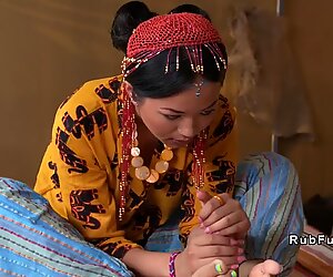Thai masseuse gives footjob