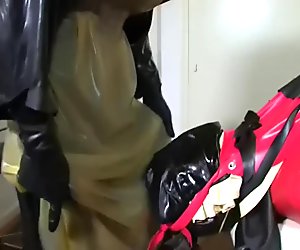 Bizarre rubber apron bondage 4 of 5