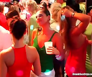 Sexy girls are having fun in a club dancing vile