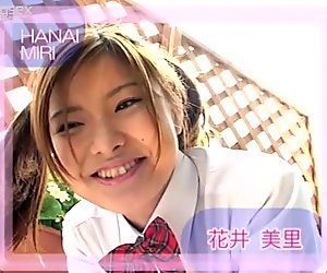 Chick with pigtails Miri Hanai makes grimaces on camera