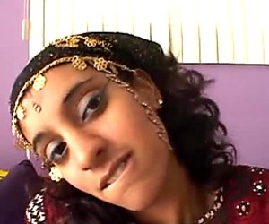 Curly haired Indian cutie with beautiful eyes gives hot blowjob