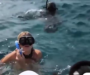 Badass babes spear fishing while naked and visit the crocs