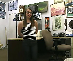 Pretty babe in glasses pawns her vagina