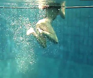 Two sexy amateurs showing their bodies off under water